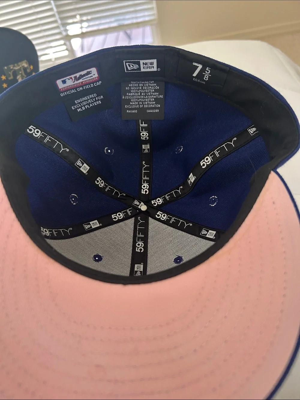 New Era Blue Snapback Cap with Pink Undervisor